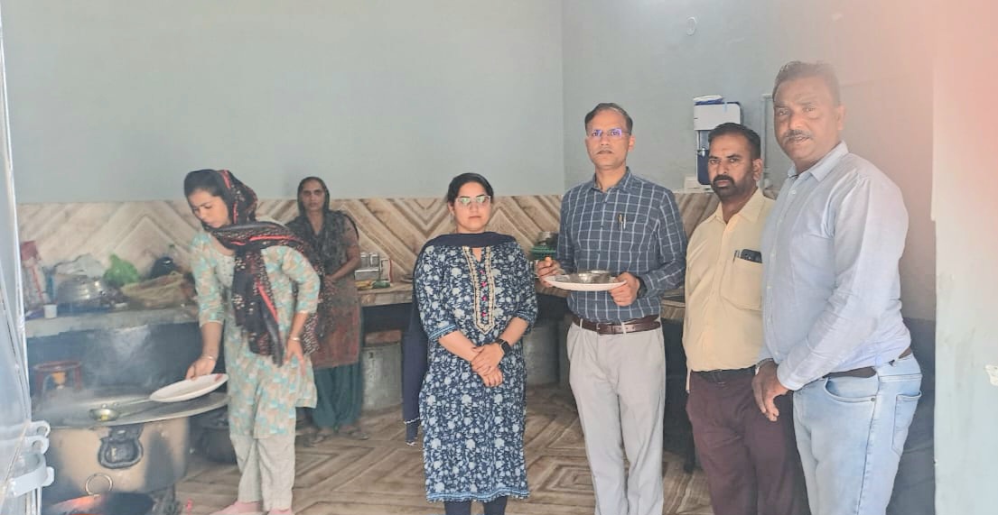 DHO inspects mid-day meal in schools.